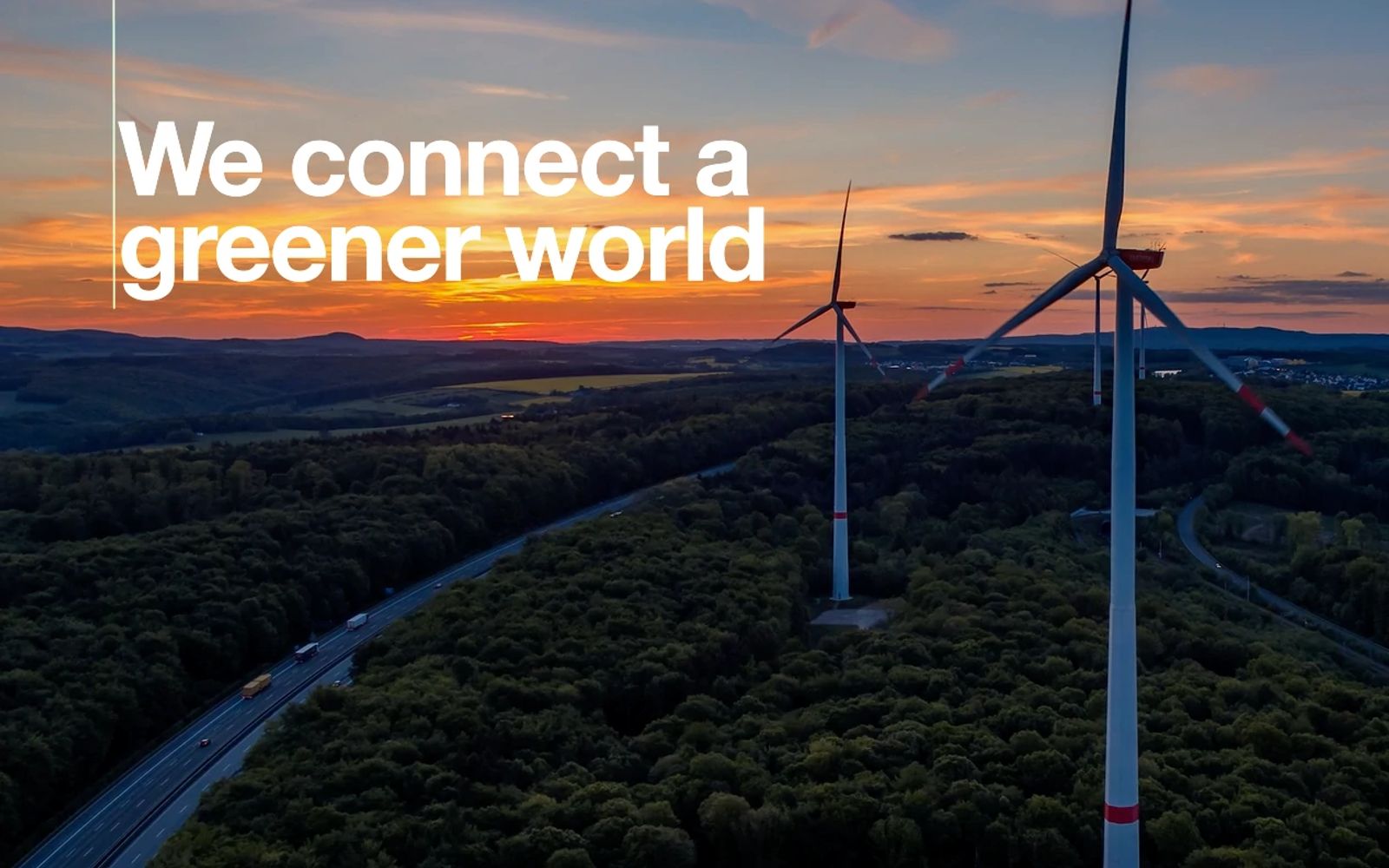 Image of wind mills with NKT Slogan We connect a greener world